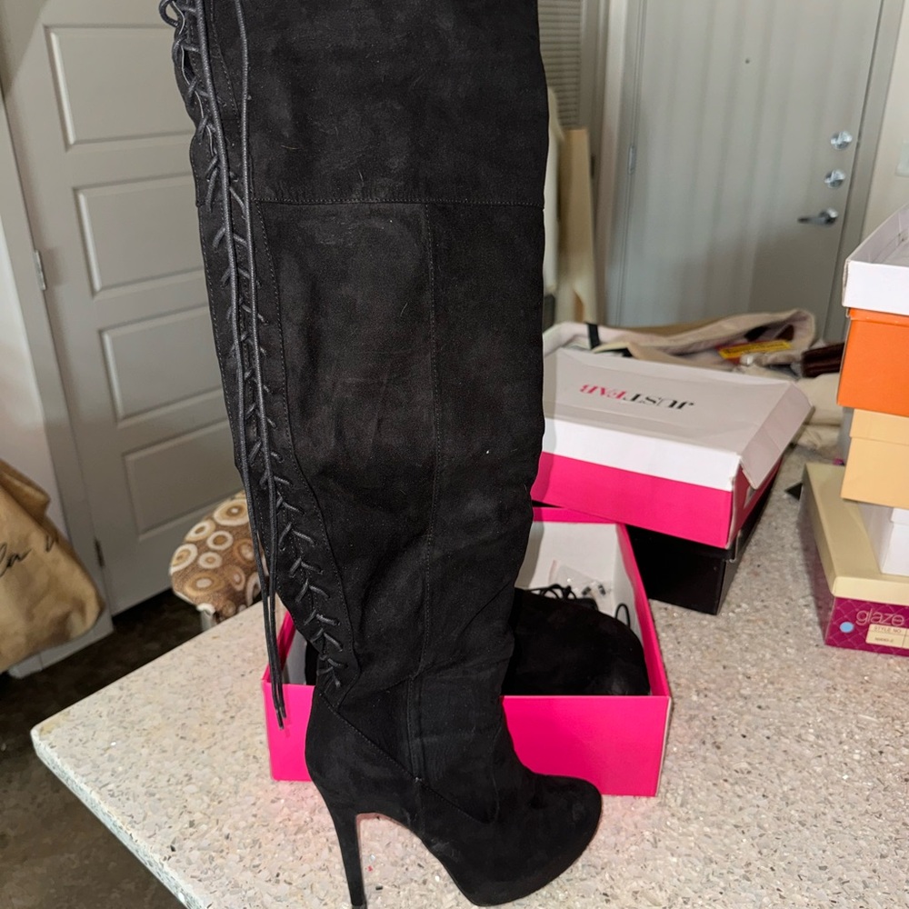 Thigh high heels. Very sexy, gently worn